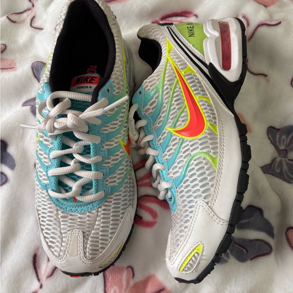 Nike White and Blue Sneakers with Breathable Mesh and Dynamic Design
